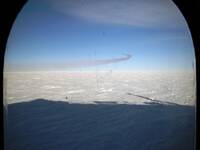 Herc contrail out the window at ARO.JPG